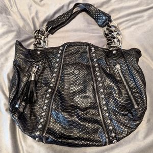 Betsey Johnson leather snake print purse.
